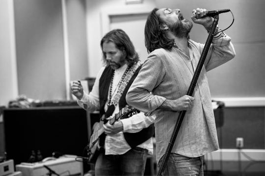 The Black Crowes, featuring once-estranged brothers Rich Robinson, left, and Chris Robinson, have reunited to tour for the first time since 2013.