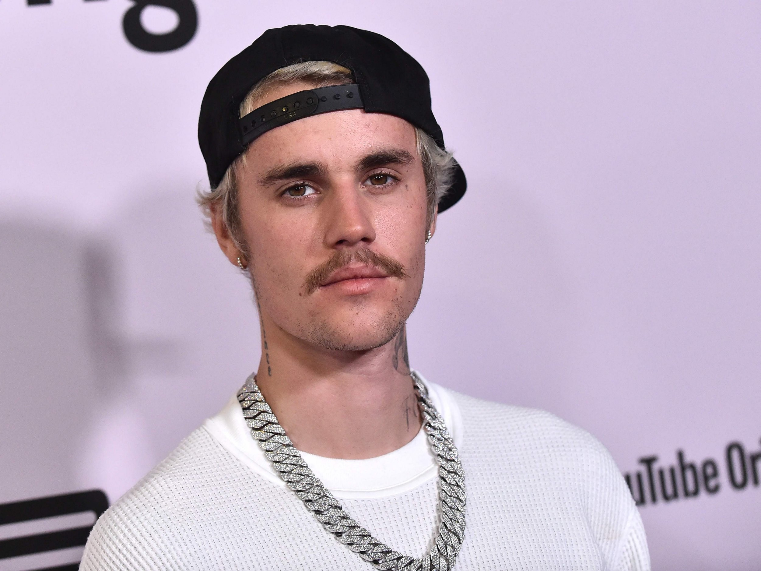 Canadian singer Justin Bieber arrives for YouTube Originals' "Justin Bieber: Seasons" premiere at the Regency Bruin Theatre in Los Angeles on January 27, 2020. (Photo by LISA O'CONNOR / AFP) (Photo by LISA O'CONNOR/AFP via Getty Images)