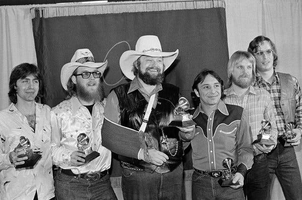 Mr. Daniels, center, with the Charlie Daniels Band in Los Angeles in 1980 after winning a Grammy Award for best country vocal performance by a group for their hit &ldquo;The Devil Went Down to Georgia.&rdquo;