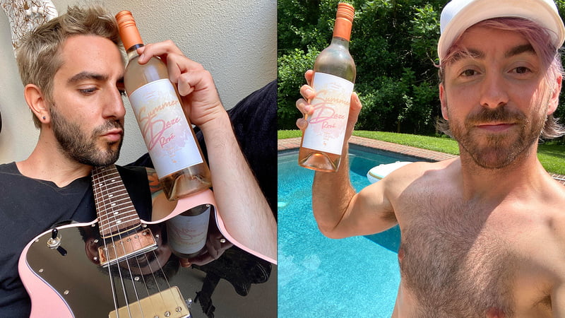 All Time Low band members Jack Barakat (left) and Alex Gaskarth with rosé bottles