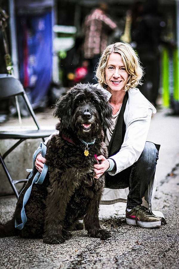 Hyde Park Jazz Festival executive and artistic director Kate Dumbleton at last year's event with her dog Blue - MICHAEL JACKSON FOR CHICAGO READER