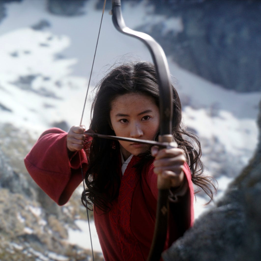 This image released by Disney shows Yifei Liu in the title role of "Mulan." Disney said Friday, June 26, 2020 that it would delay the release of the live-action adaptation until Aug, 21, 2020, after having already delayed its release from March until July because of the coronavirus pandemic.