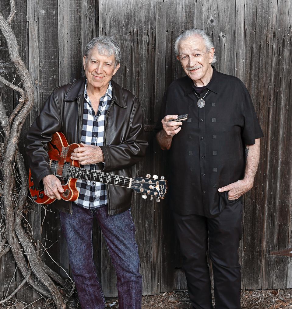 Elvin Bishop and Charlie MUsselwhite: two kindred souls, standing on a back porch