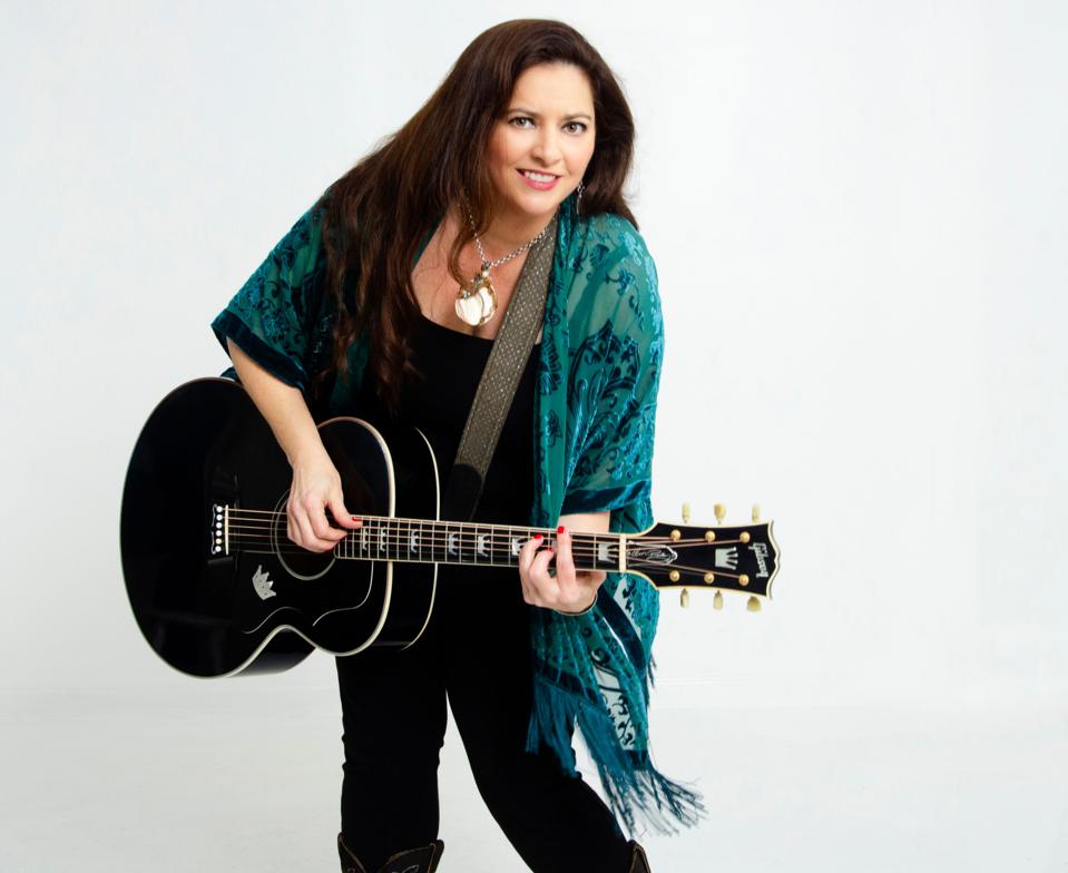 Shelley King with her guitar